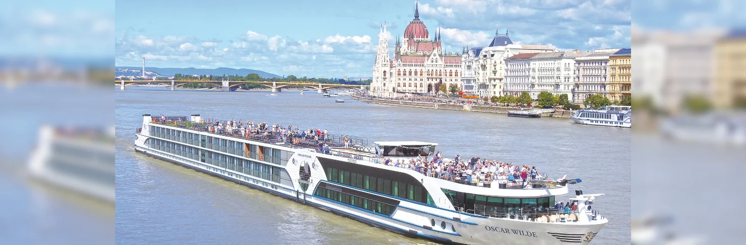 M.S. Oscar Wilde sailing on the Danube in Budapest, passing the Hungarian Parliament Building