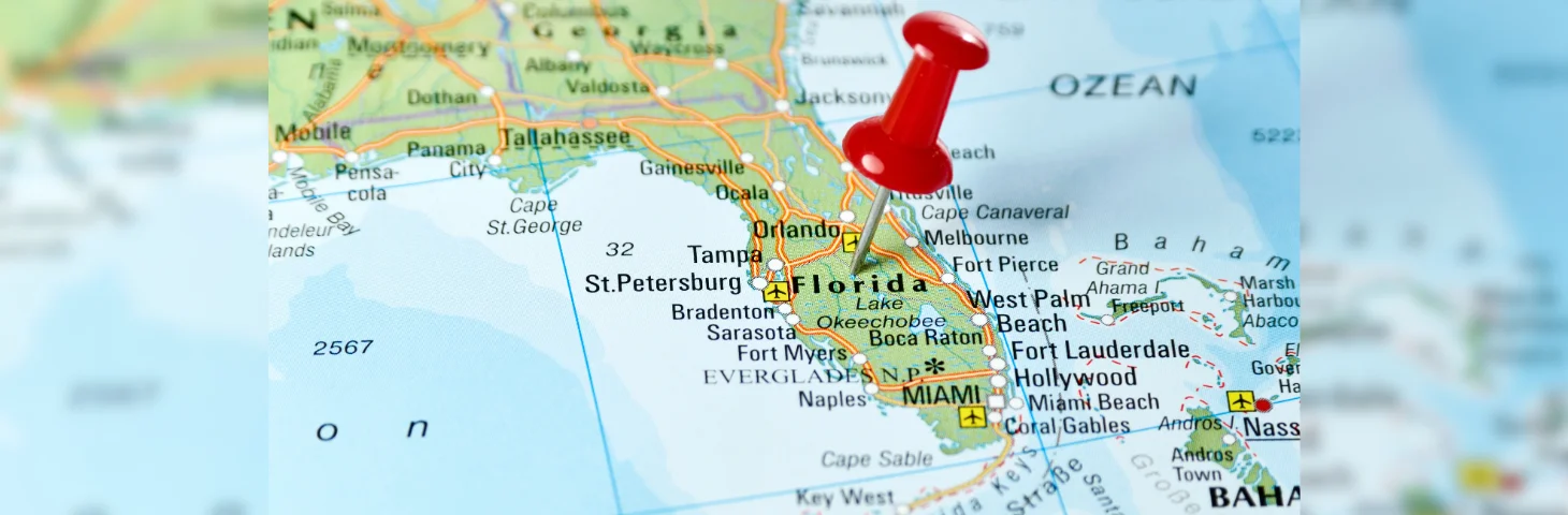 A red pin in a map of Florida.