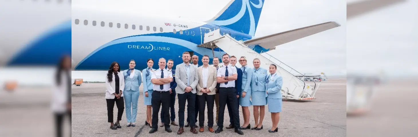 Image of Norse crew standing outside a plane